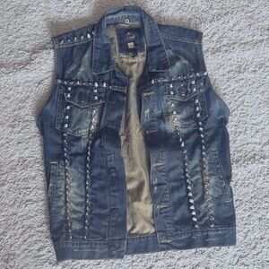 Custom made denim vest with studs and decoration